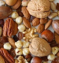Selecion of nuts, almonds and sultanas, close up